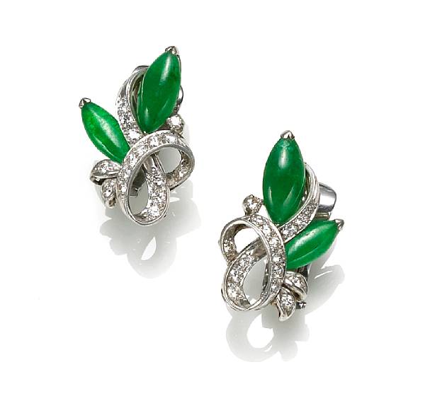 Appraisal: A pair of jadeite jade and diamond earclips mounted in