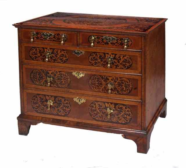 Appraisal: A LATE TH CENTURY WALNUT AND MARQUETRY CHEST the top