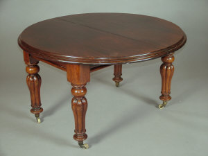 Appraisal: A Victorian mahogany dining table mid th century the moulded