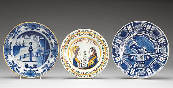 Appraisal: Three Dutch Delft platters th century The first painted with