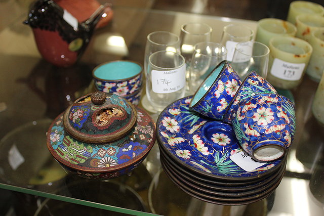 Appraisal: A SET OF FIVE CHINESE ENAMELLED CUPS AND SAUCERS decorated