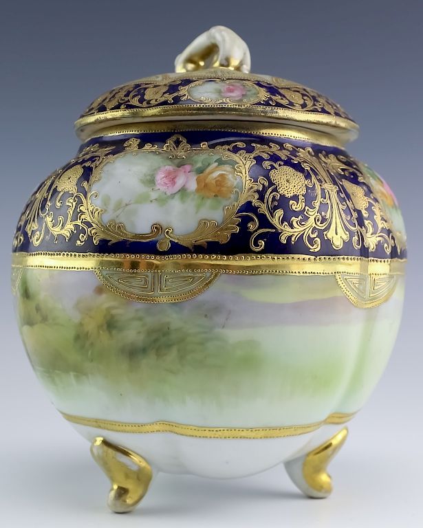 Appraisal: Nippon Japanese Porcelain Lidded Tri-Footed Jar Antique Nippon porcelain lidded