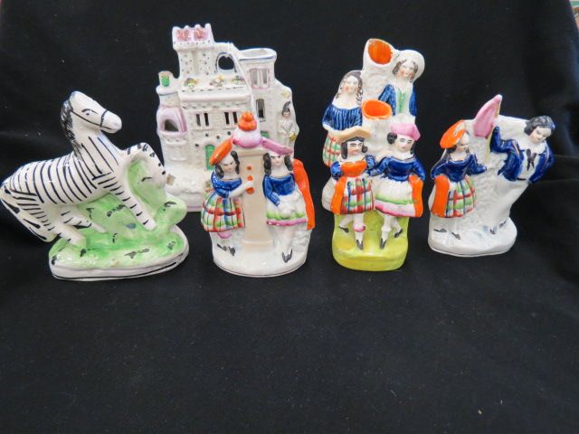 Appraisal: pcs Staffordshire Pottery Zebra dancing couples castle more mostly to