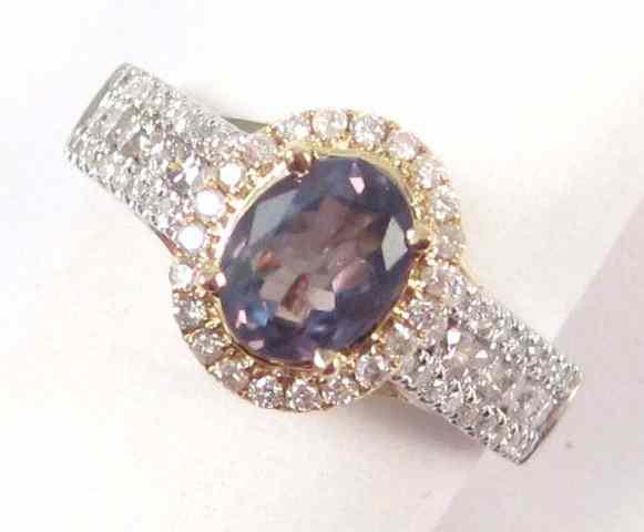 Appraisal: NATURAL COLOR CHANGE ALEXANDRITE AND DIAMOND RING k white and