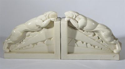 Appraisal: A pair of St Clement Art Deco pottery book ends