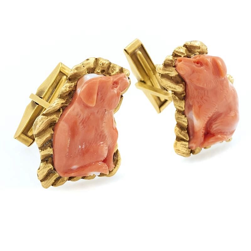 Appraisal: k Yellow gold and coral pig cufflinks k Yellow gold