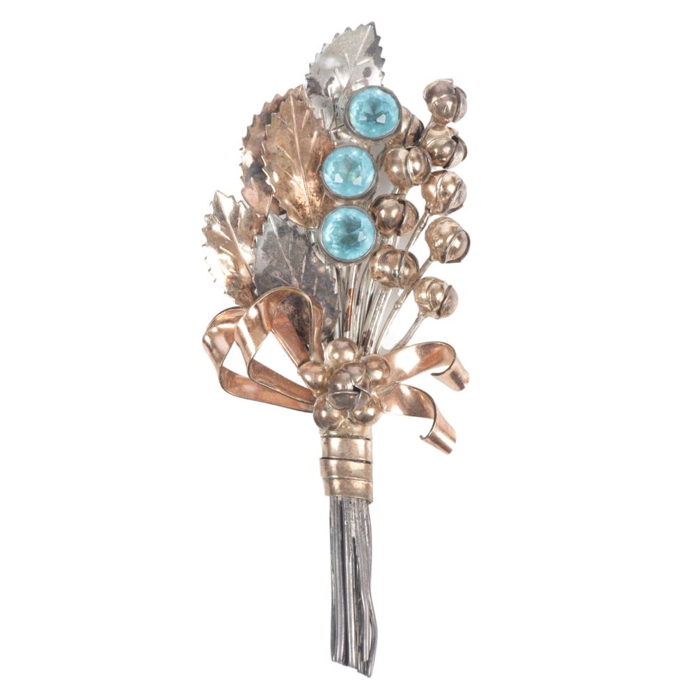 Appraisal: HOBE STERLING AND VERMEIL BICOLORED SPRAY PIN WITH AQUA BEZEL-SET