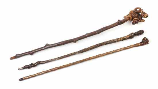 Appraisal: A Collection of Three Walking Sticks comprising an example with