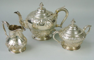 Appraisal: An Edwardian silver three piece tea set London comprising of