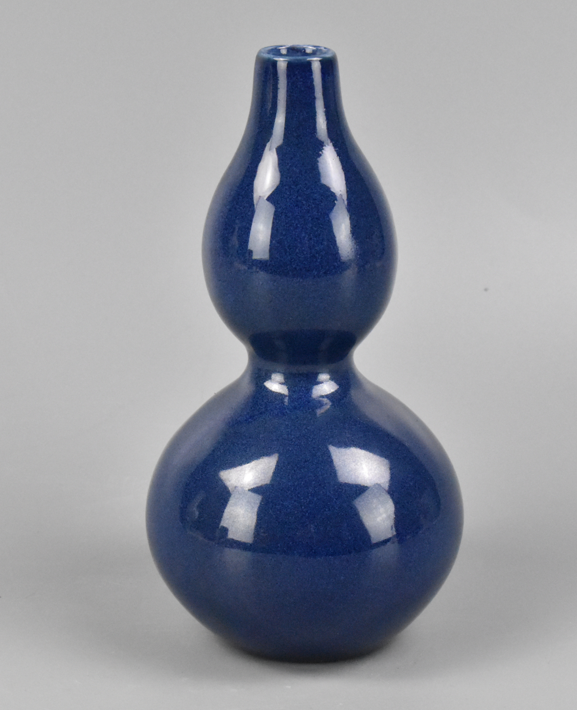 Appraisal: A Chinese blue glazed gourd vase dating from the th