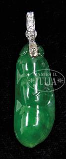 Appraisal: EMERALD GREEN JADE PENDANT th century China The pendant carved