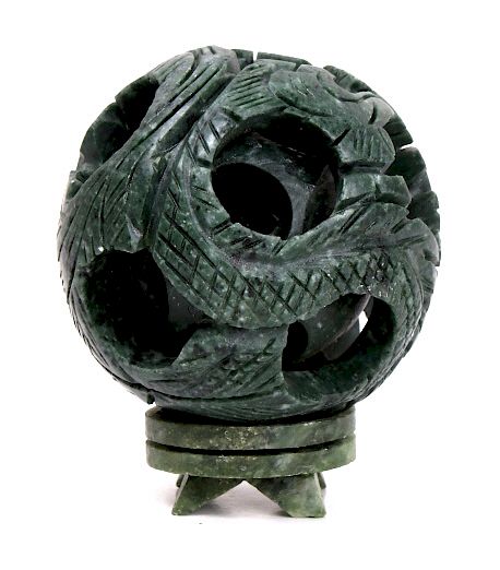 Appraisal: Four Layer Chinese Floral Jade Puzzle Ball For your bidding