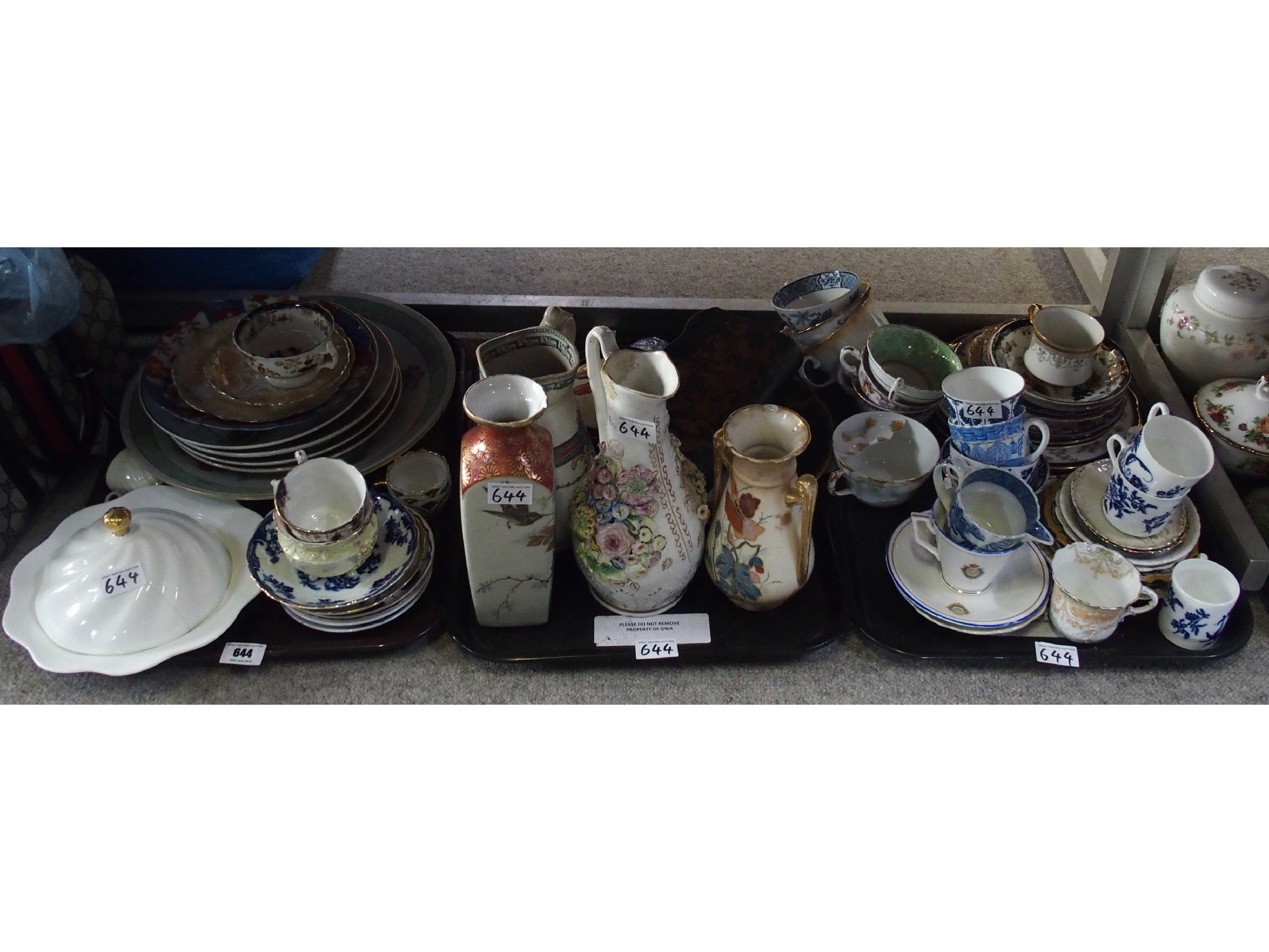 Appraisal: Three trays comprising various ceramics including blue and white cups