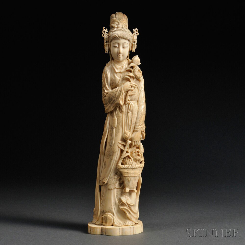 Appraisal: Ivory Carving of a Woman China Japan th century standing