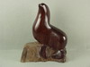 Appraisal: SCULPTURE - LIGNUM VITAE OF A SEAL ON A ROCK