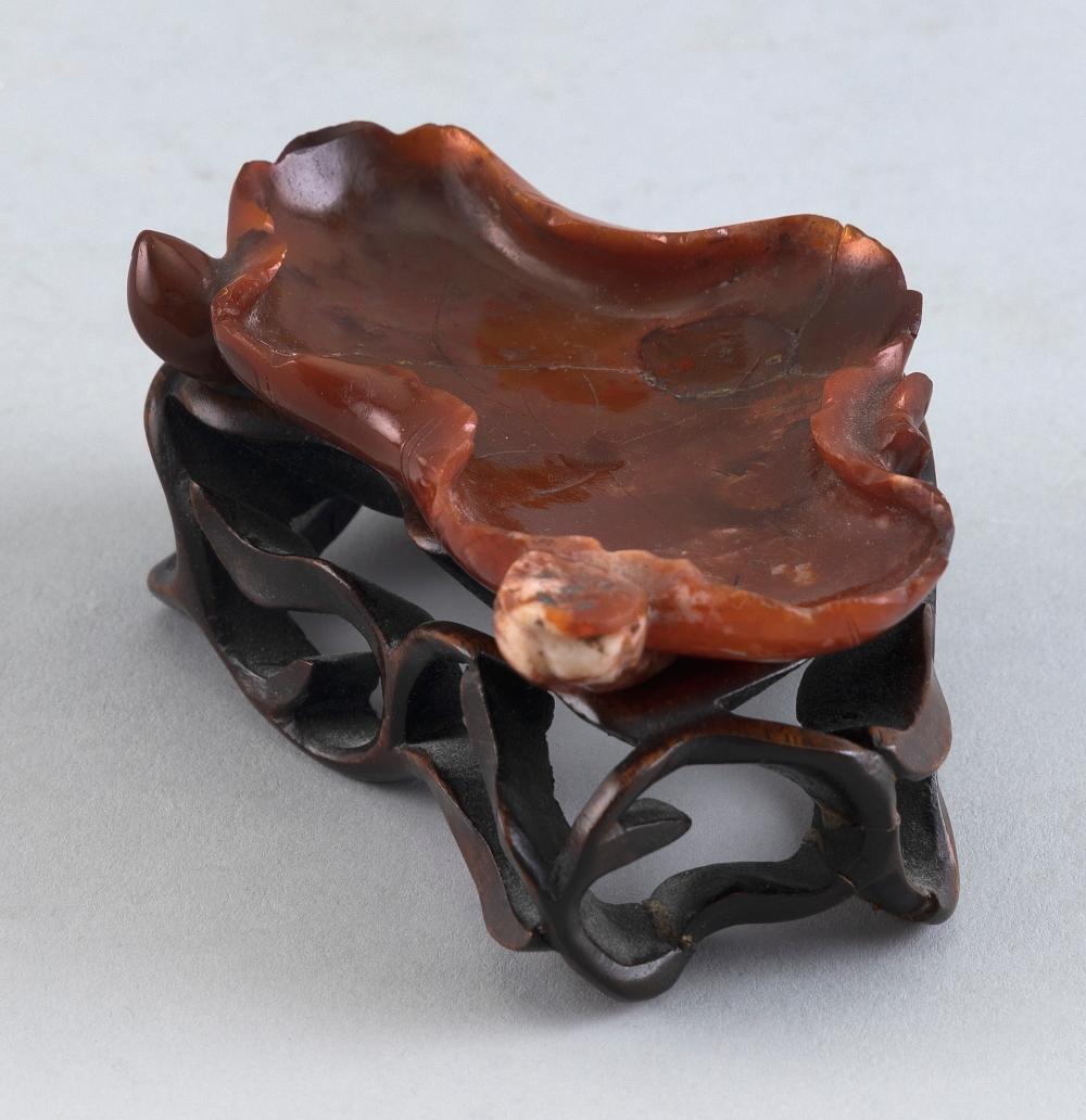 Appraisal: CHINESE CARVED RED AGATE LEAF-FORM BRUSH WASHER LATE TH EARLY