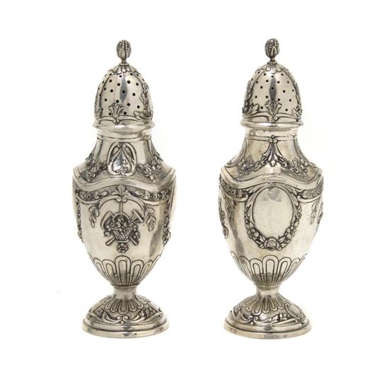 Appraisal: A Pair of Silver Casters Height inches