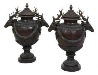 Appraisal: A PAIR OF MONUMENTAL PATINATED METAL URNS WITH DEER MASK