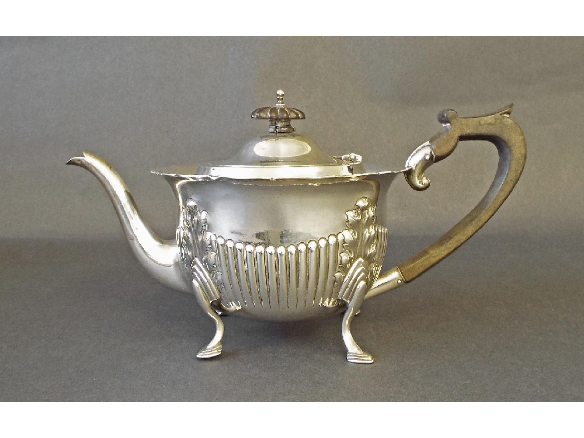 Appraisal: Edwardian silver half fluted bachelor teapot maker Harrison Brothers Howson