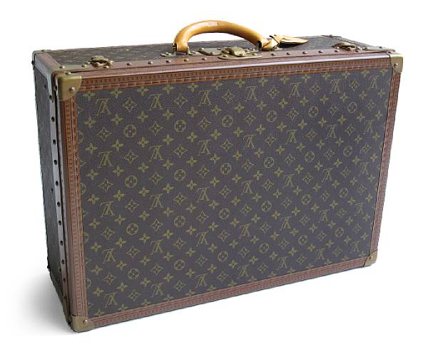 Appraisal: A Louis Vuitton suitcase The rectangular case with removable tray