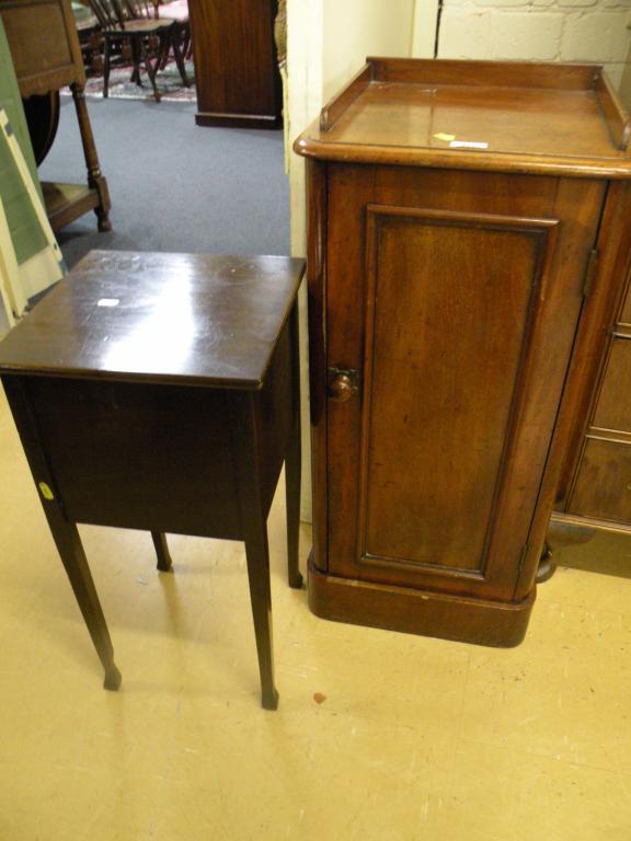 Appraisal: A Victorian mahogany pot cupboard with a raised back and