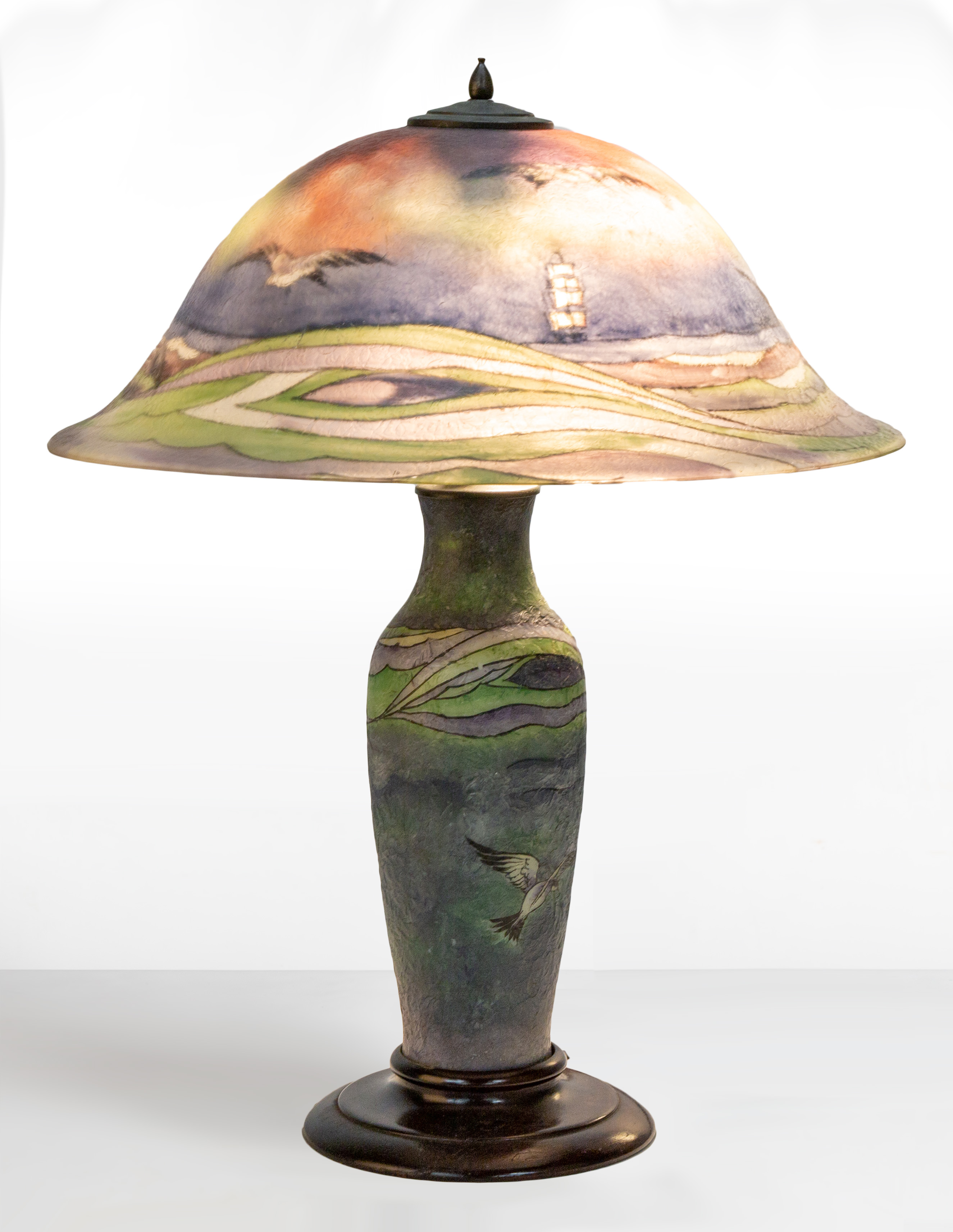 Appraisal: UNUSUAL PAIRPOINT REVERSE PAINTED SEASCAPE TABLE LAMP Early th century