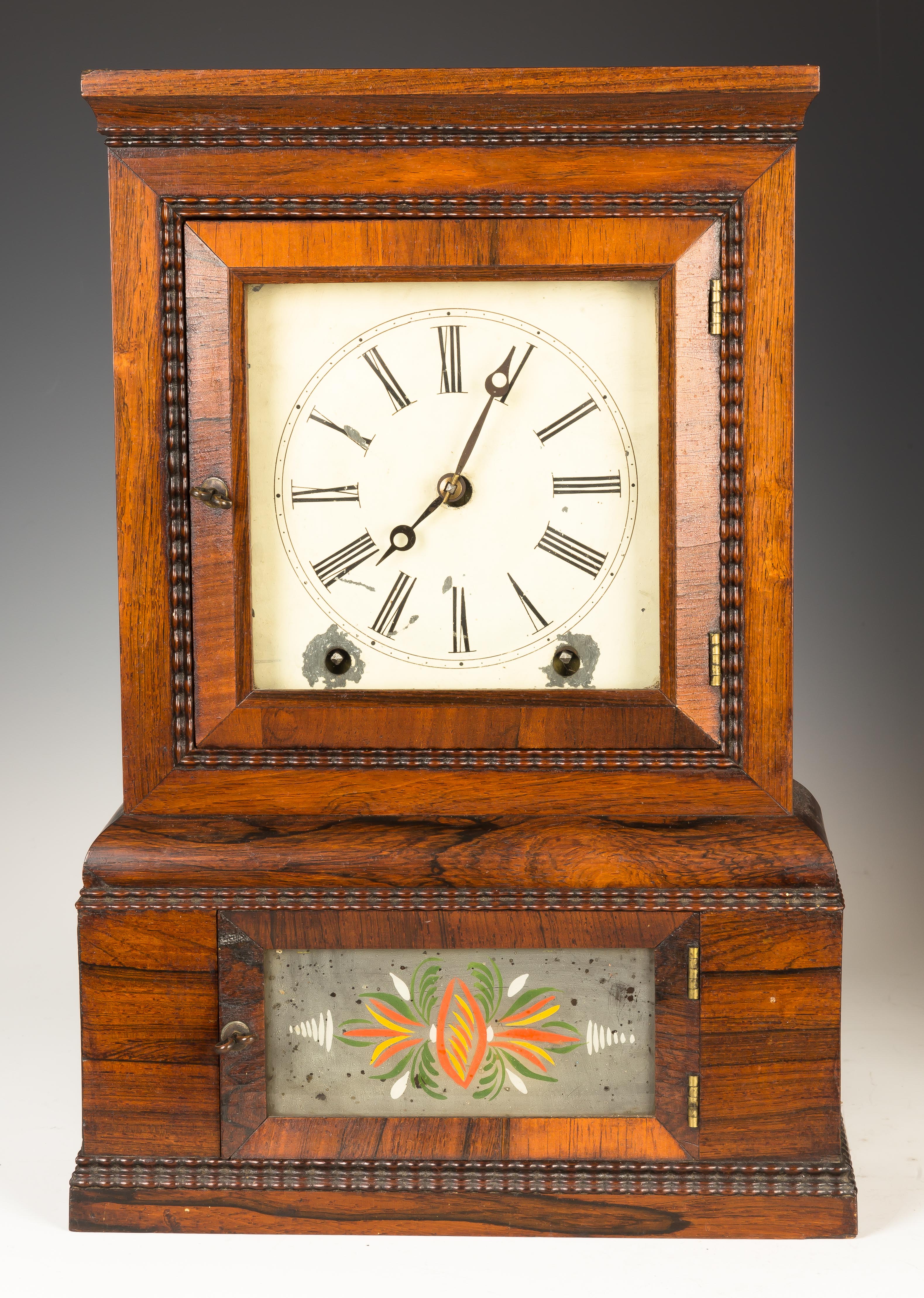 Appraisal: William Johnson Cottage Clock Rosewood and rippled trim case old