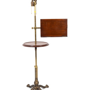 Appraisal: An English Brass Adjustable Floor Lamp with Mahogany Table and