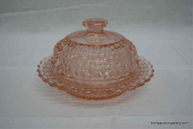 Appraisal: 's Pink Glass Button Bows Butter Dish LidProduced by Jeannette