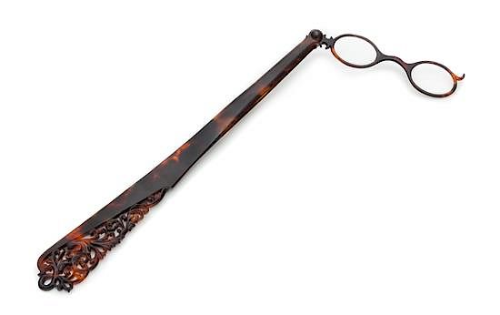 Appraisal: A Victorian Carved Tortoise Shell Lorgnette Length inches A Victorian