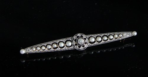 Appraisal: A diamond and pearl bar brooch the central diamond set