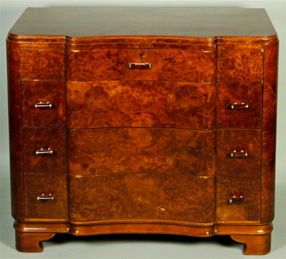 Appraisal: ART DECO POLISHED VENEERED CHEST OF DRAWERS having a rectangular