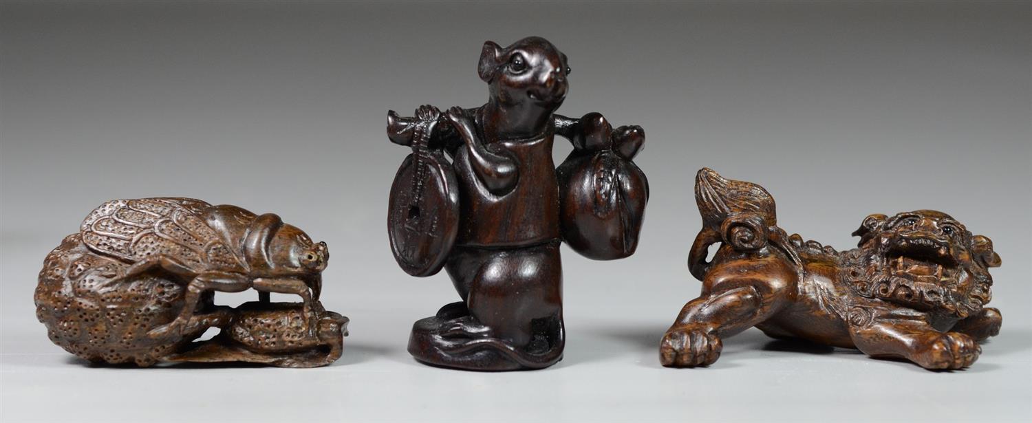 Appraisal: Japanese hardwood carvings cicada missing an eye foo dog and