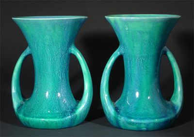 Appraisal: A pair of Pilkington's Royal Lancastrian vases twin-handled form covered