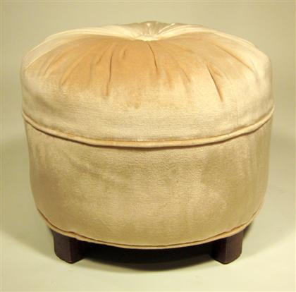 Appraisal: French over stuffed pouffe The cream upholstered padded top raised