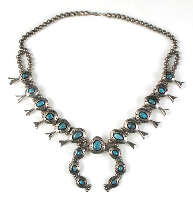 Appraisal: NAVAJO TURQUOISE STERLING SQUASH BLOSSOM NECKLACE silver beads with Turquoise