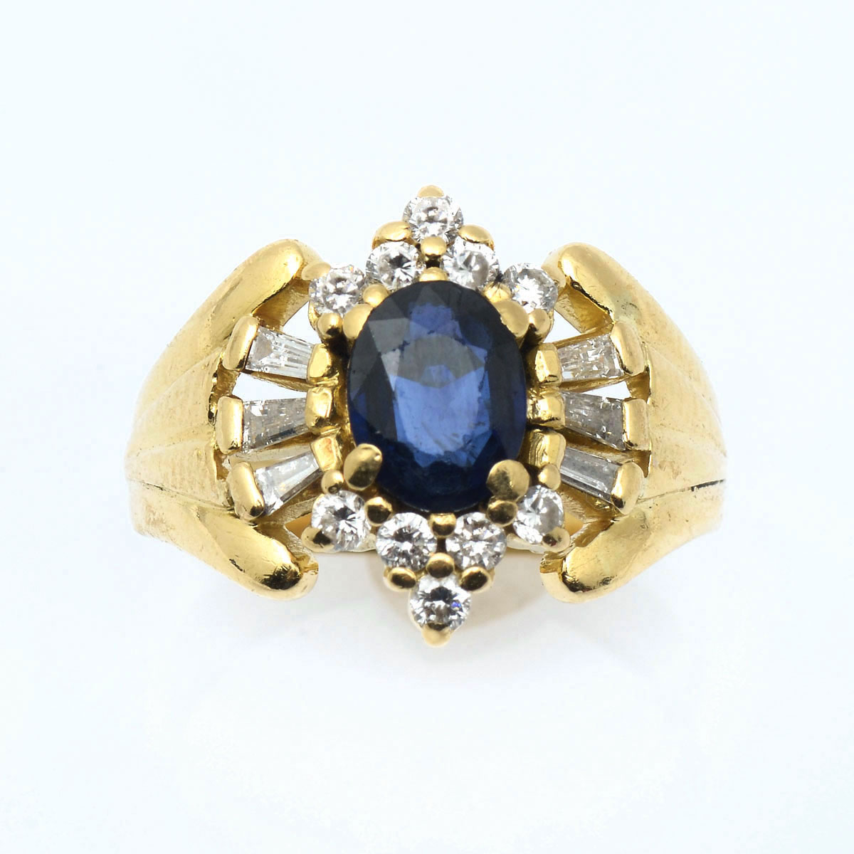 Appraisal: K SAPPHIRE AND DIAMOND RING K yellow gold sapphire and