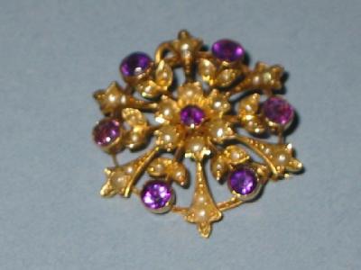 Appraisal: A VICTORIAN AMETHYST AND PEARL BROOCH of circular form the