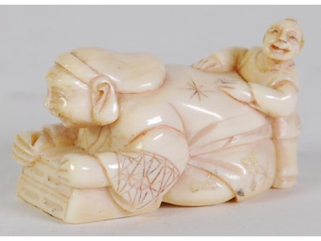 Appraisal: LATE NINETEENTH CENTURY JAPANESE CARVED IVORY NETSUKE OF A MAN