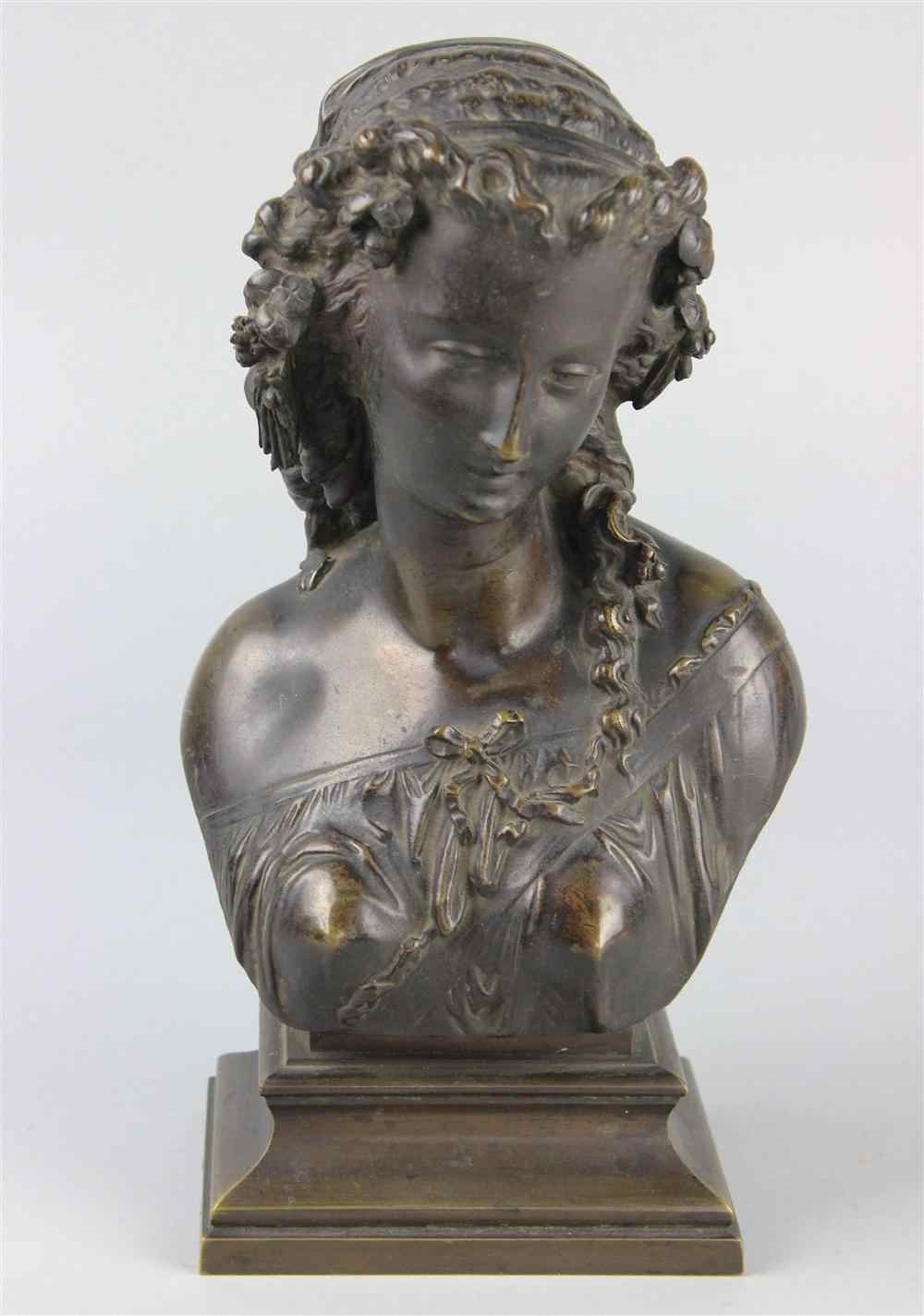 Appraisal: BRONZE BUST OF A NYMPH modelled looking down to the