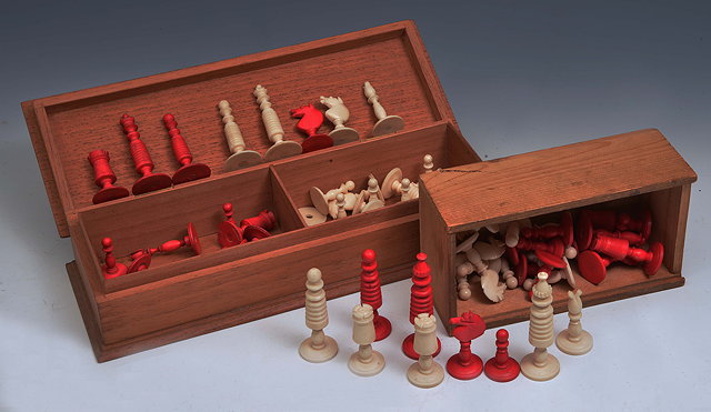 Appraisal: A POSSIBLY INDIAN TURNED IVORY AND STAINED IVORY CHESS SET