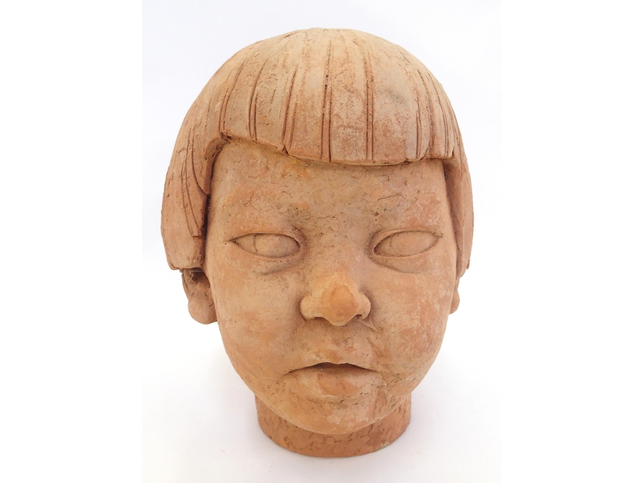 Appraisal: Terracotta sculpture of a youth's head