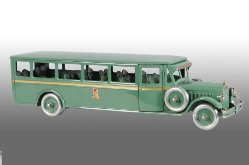 Appraisal: Pressed Steel Buddy L Bus Toy Description Circa Painted gold