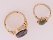 Appraisal: Rings- two including a man s carved onyx together with