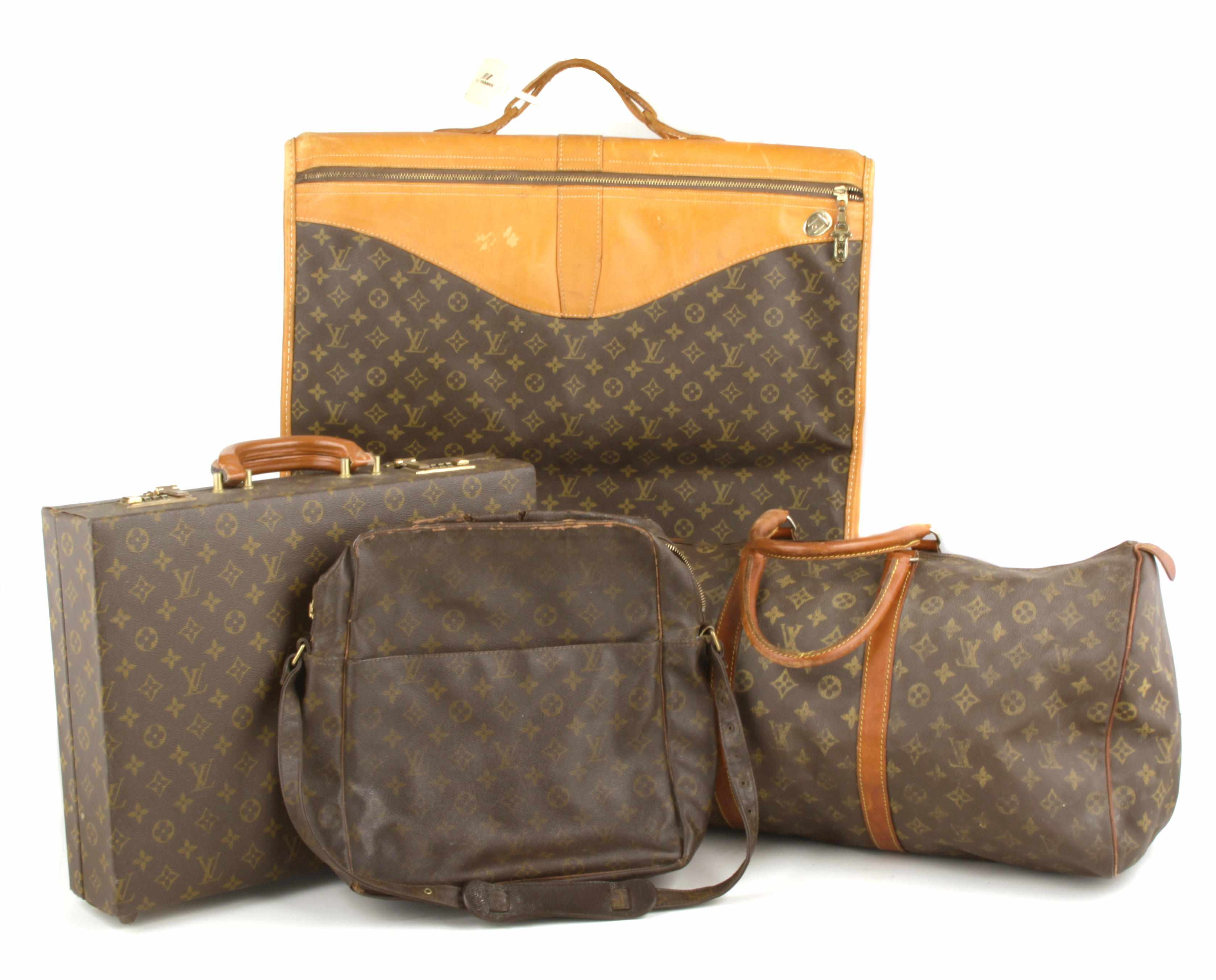 Appraisal: A group of Louis Vuitton luggage Comprising a briefcase a