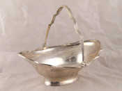 Appraisal: A late Victorian silver swing handled oval basket with shaped