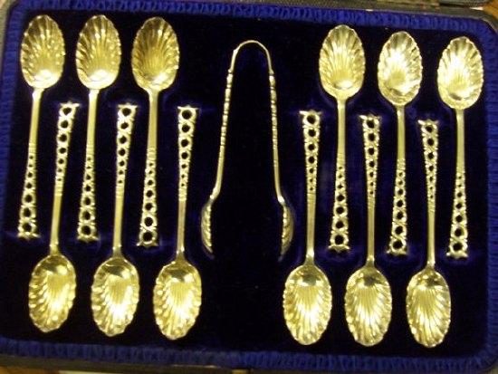 Appraisal: A cased set of twelve teaspoons and a pair of