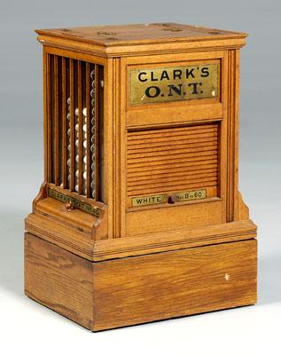 Appraisal: Clarke s O N T oak spool cabinet countertop sewing