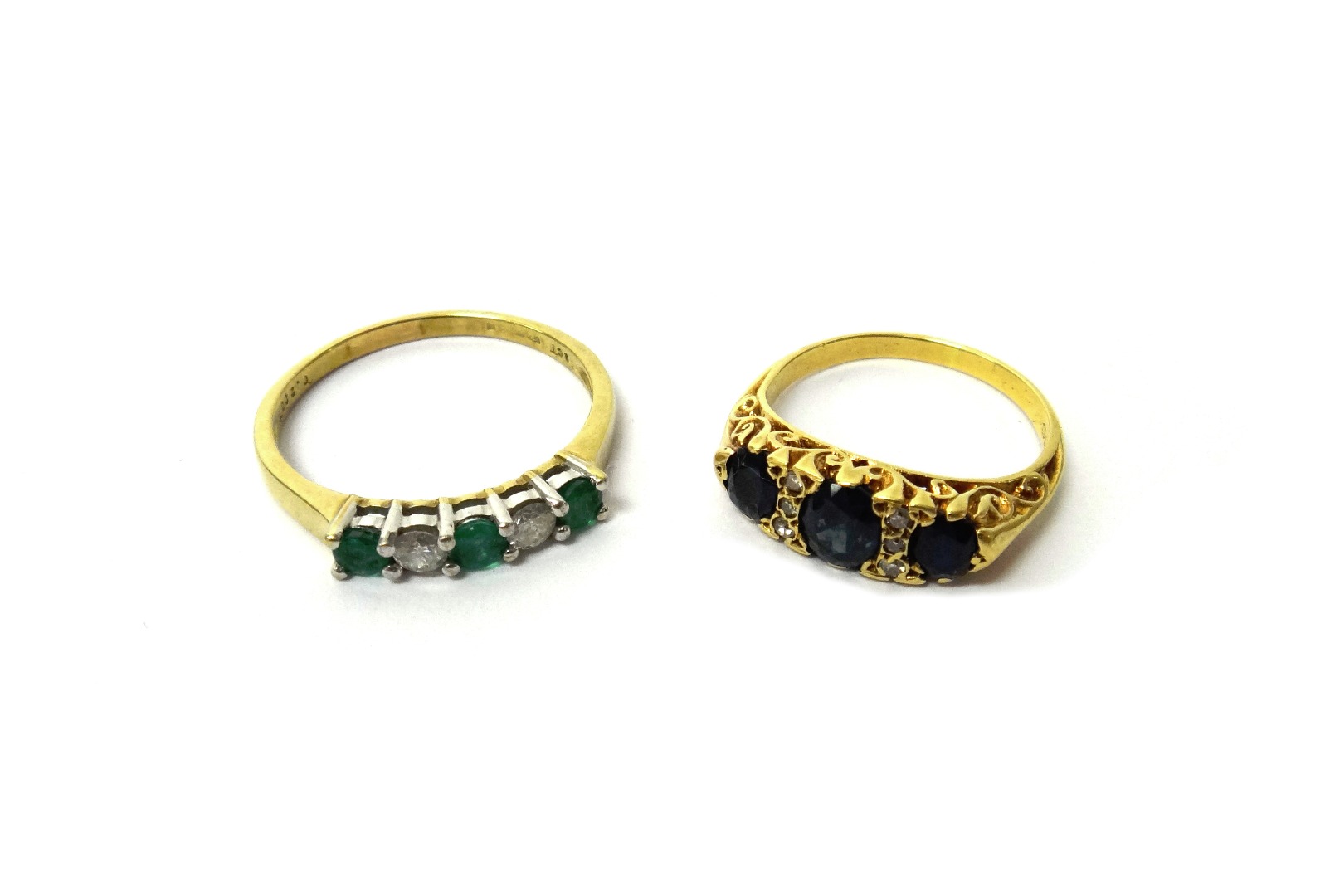 Appraisal: A ct gold emerald and diamond set five stone ring