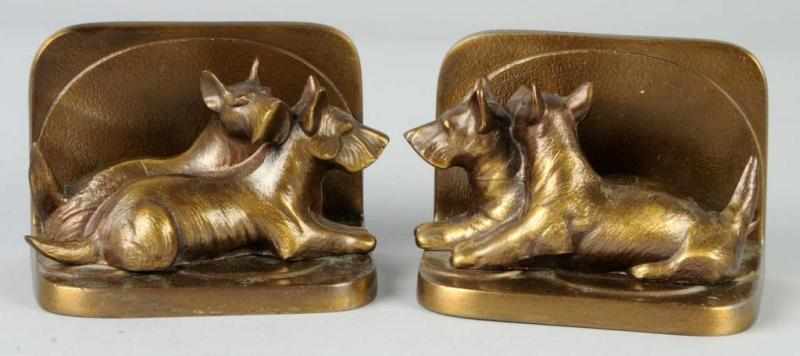 Appraisal: Pair of Sitting Scottie Bookends Description Spelter Double lying down